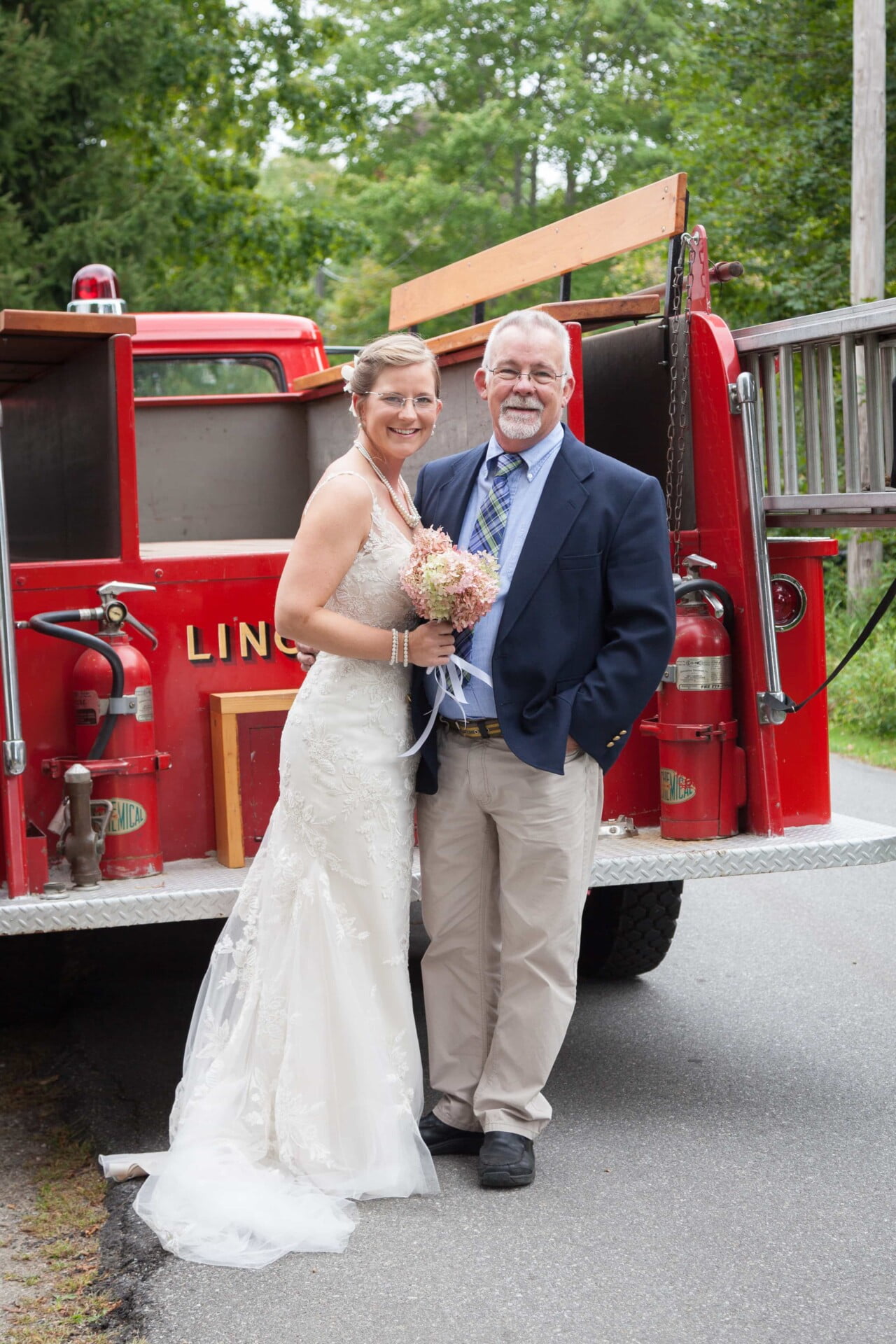 Bride with her father next to firetruck - Lincolnville, Maine