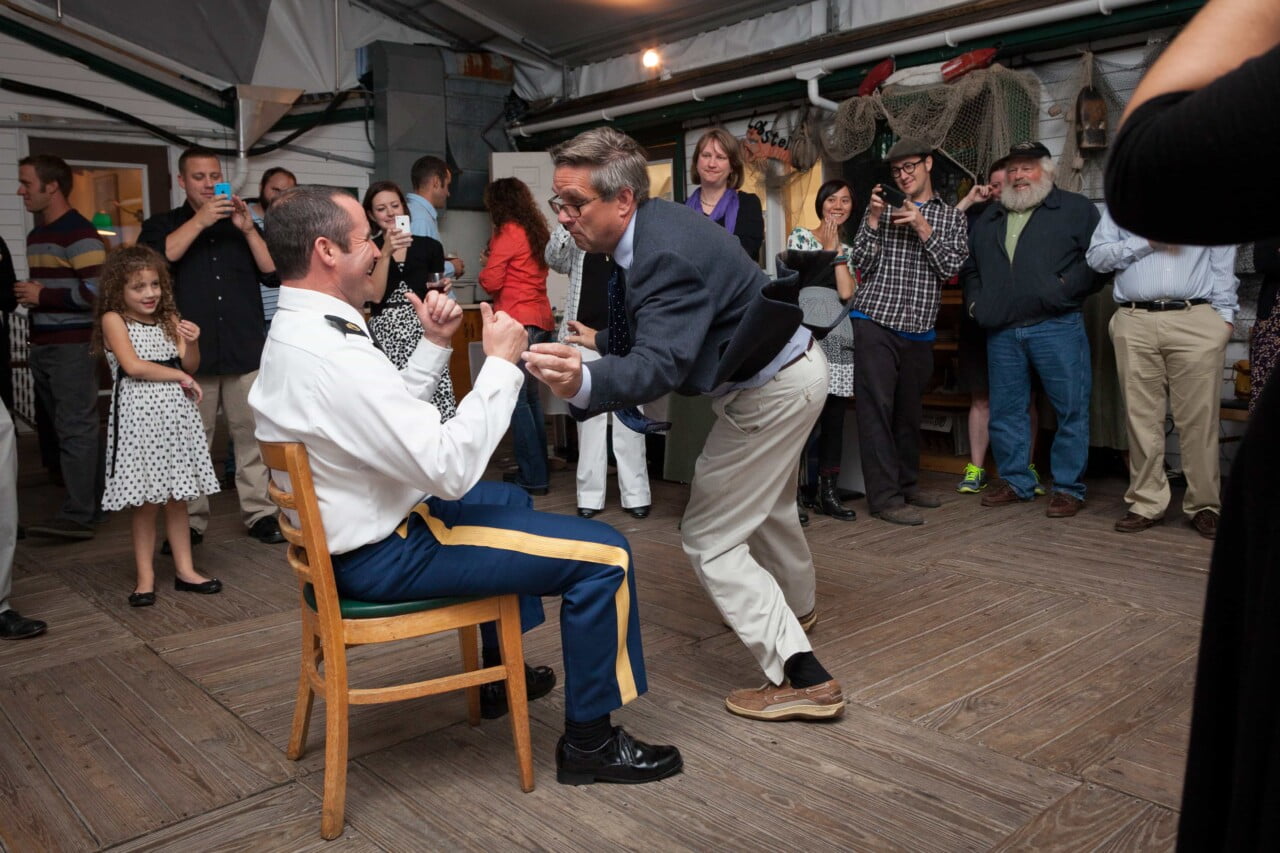 Wedding guest dancing for groom - Lincolnville, Maine wedding