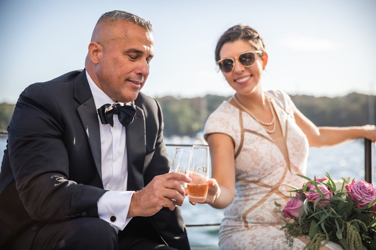 Camden Maine Wedding - Schooner Surprise - Bride and Groom toast © 5iveLeaf Photography