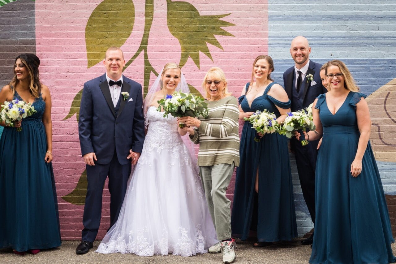Governor Janet Mills poses for a photo with the bride and groom © 5iveLeaf Photography
